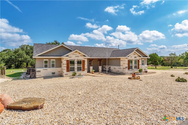 ranch-style house featuring a patio area