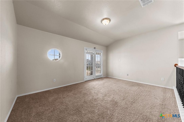 unfurnished living room with carpet flooring, baseboards, and visible vents