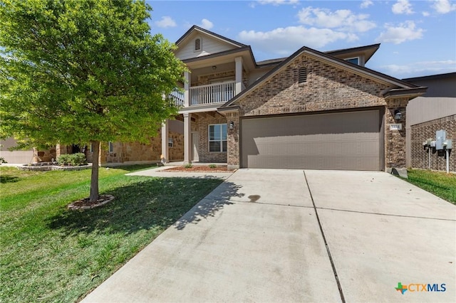 traditional-style home with an attached garage, concrete driveway, a balcony, brick siding, and a front lawn