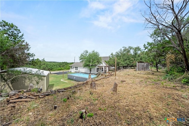 1110 Twin Deer Ln, Canyon Lake, TX 78133 - view of yard with an outdoor pool