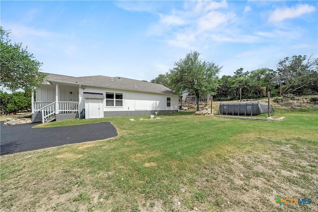 1110 Twin Deer Ln, Canyon Lake, TX 78133 - view of green lawn with an outdoor pool