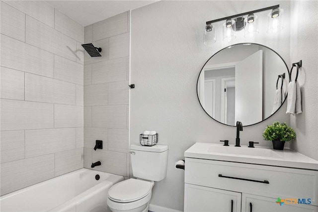 full bathroom with toilet, vanity, and tiled shower / bath