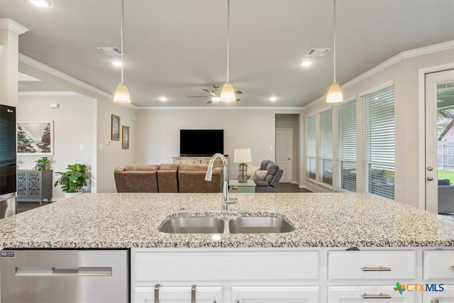 1330 Logan Blvd, Salado, TX 76571 - kitchen featuring dishwasher, light stone counters, open floor plan, crown molding, and ceiling fan