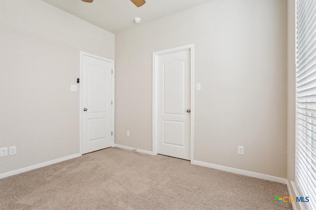 1330 Logan Blvd, Salado, TX 76571 - spare room with light colored carpet, a ceiling fan, and a smoke detector