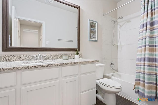 1330 Logan Blvd, Salado, TX 76571 - full bath with shower / bath combo with shower curtain, vanity, and wood finished floors