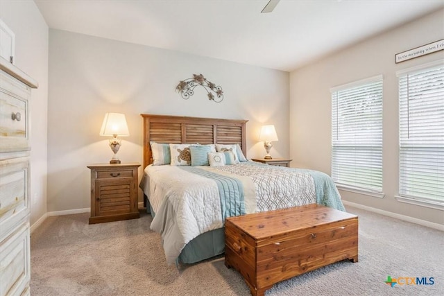 1330 Logan Blvd, Salado, TX 76571 - bedroom featuring carpet, multiple windows, and a ceiling fan