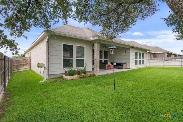 1330 Logan Blvd, Salado, TX 76571 - back of house featuring a ceiling fan, a fenced backyard, an outdoor living space, and a patio area