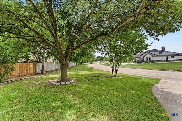 view of yard with fence