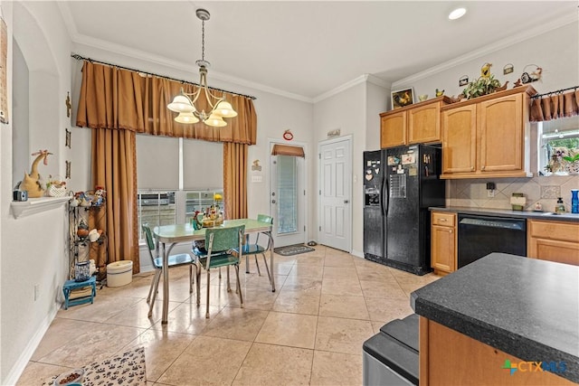 kitchen featuring dark countertops, black appliances, tasteful backsplash, and crown molding