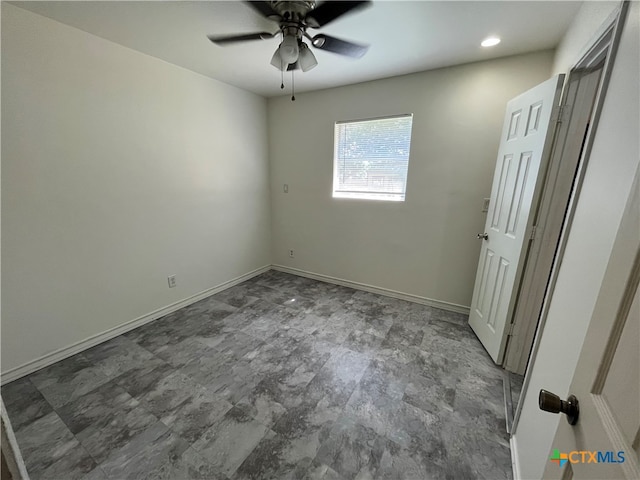 spare room featuring ceiling fan