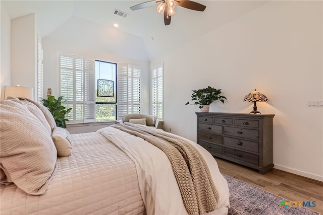 108 Rainbow Valley Trl, San Marcos, TX 78666 - bedroom with vaulted ceiling, wood finished floors, baseboards, and ceiling fan