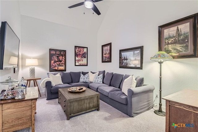 108 Rainbow Valley Trl, San Marcos, TX 78666 - living area with carpet floors, a ceiling fan, high vaulted ceiling, and baseboards
