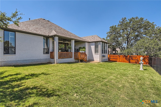 108 Rainbow Valley Trl, San Marcos, TX 78666 - rear view of property featuring brick siding and roof with shingles