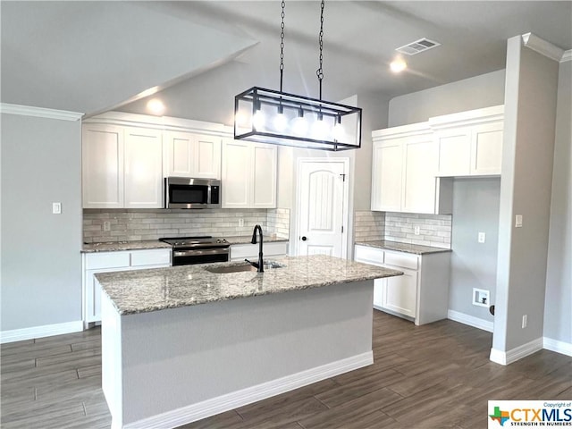 3827 Leming Ct, Temple, TX 76504 - kitchen with appliances with stainless steel finishes, a sink, light stone countertops, decorative backsplash, and white cabinets