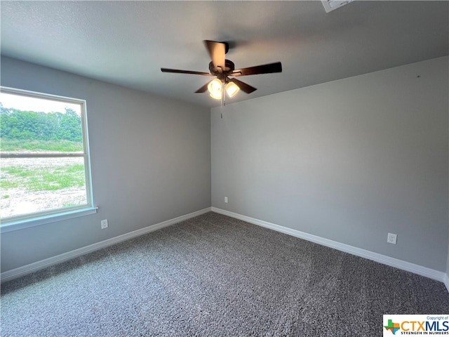 unfurnished room with ceiling fan and carpet floors