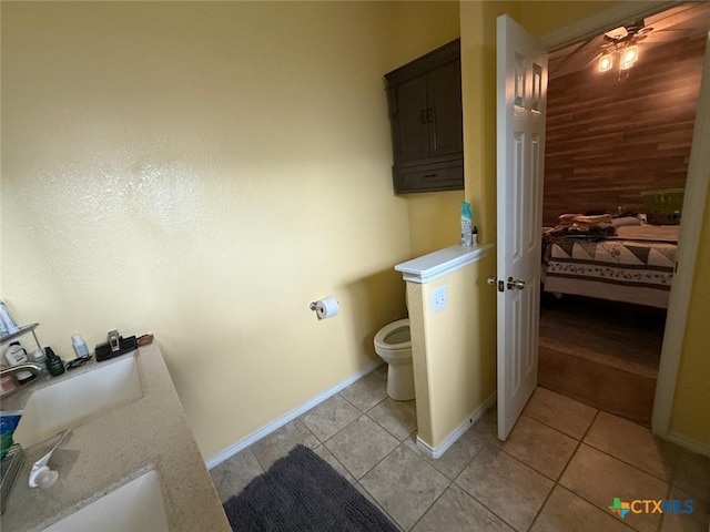 5629 Stonehaven Dr, Temple, TX 76502 - bathroom with baseboards, a ceiling fan, tile patterned floors, and toilet