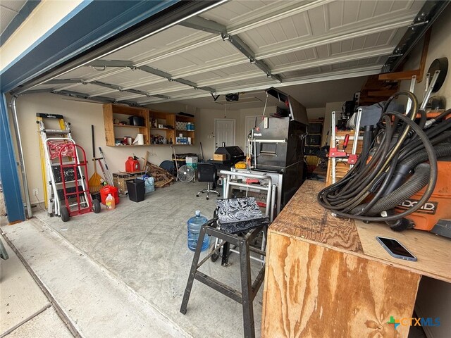 5629 Stonehaven Dr, Temple, TX 76502 - garage featuring a garage door opener