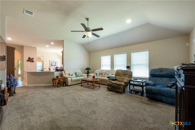 carpeted living area featuring ceiling fan, lofted ceiling, healthy amount of natural light, and recessed lighting