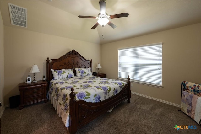 carpeted bedroom featuring baseboards and ceiling fan