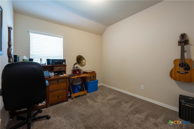 carpeted office featuring baseboards and lofted ceiling