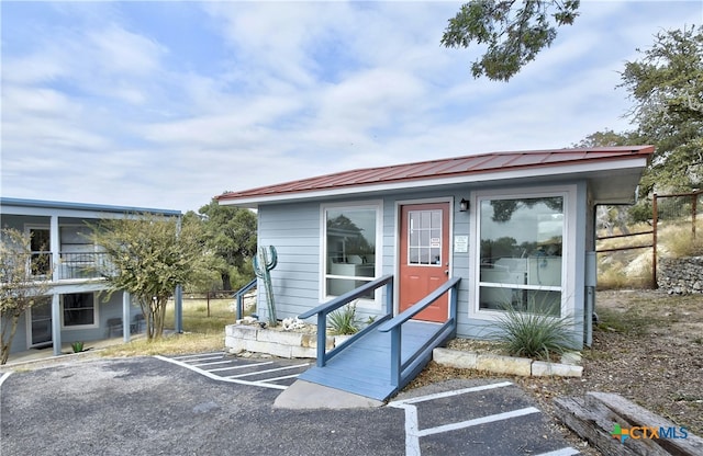 entrance to property featuring a balcony