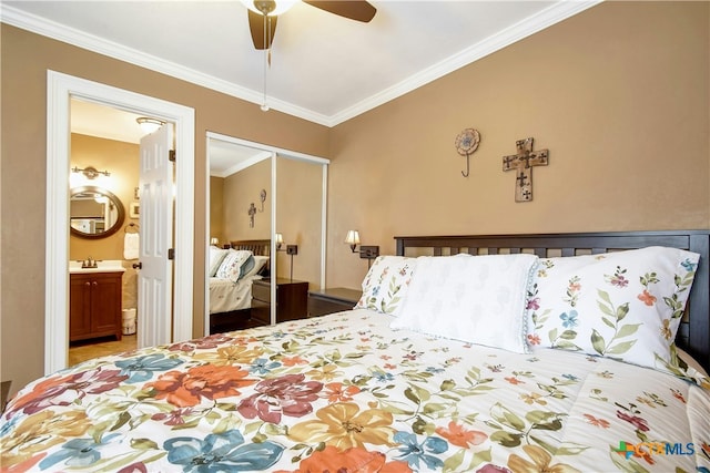 bedroom with ornamental molding, a closet, ceiling fan, and ensuite bath