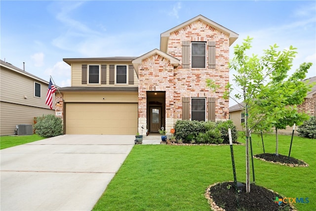 view of front property with a garage, cooling unit, and a front yard