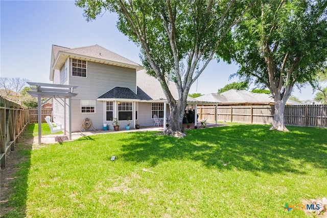 rear view of house with a patio, a yard, a fenced backyard, and a pergola