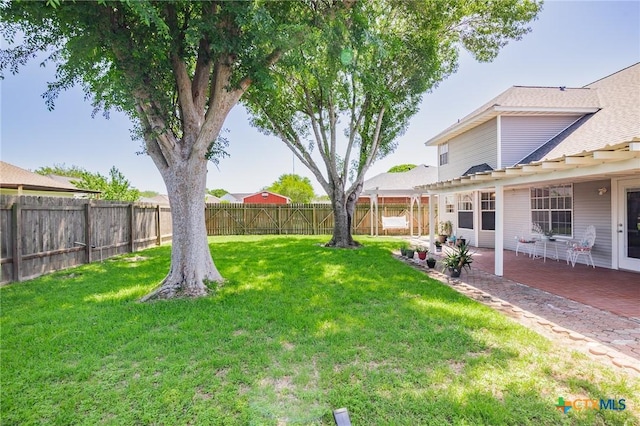 view of yard with a fenced backyard, a patio, and a pergola