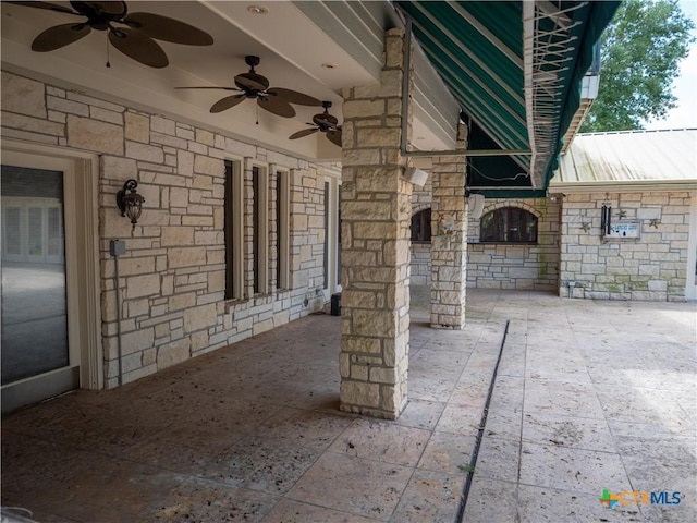 view of patio with a ceiling fan