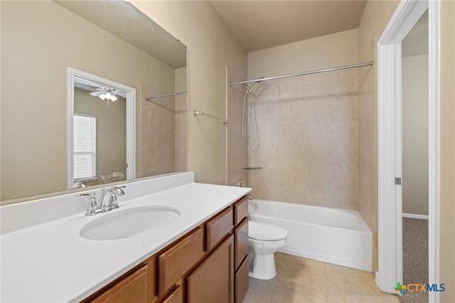 bathroom with vanity, bathing tub / shower combination, toilet, and tile patterned floors