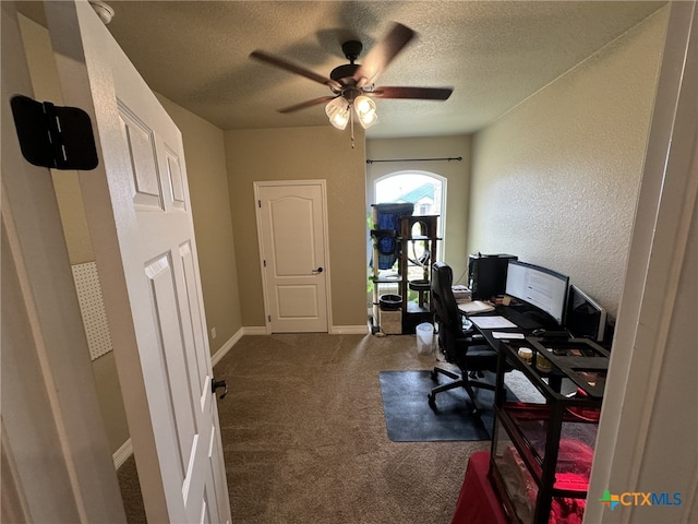 office space featuring ceiling fan, a textured ceiling, and carpet flooring