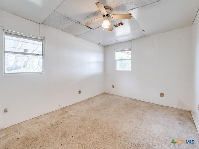 1400 Qappuella Dr, Canyon Lake, TX 78133 - empty room with a ceiling fan, visible vents, and carpet floors