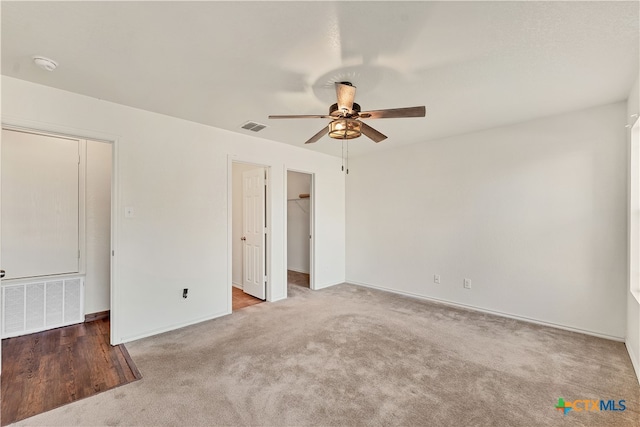 interior space featuring ceiling fan