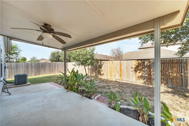 view of patio with central AC unit and ceiling fan