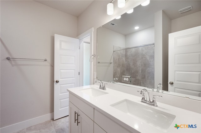 bathroom featuring vanity and tile patterned floors