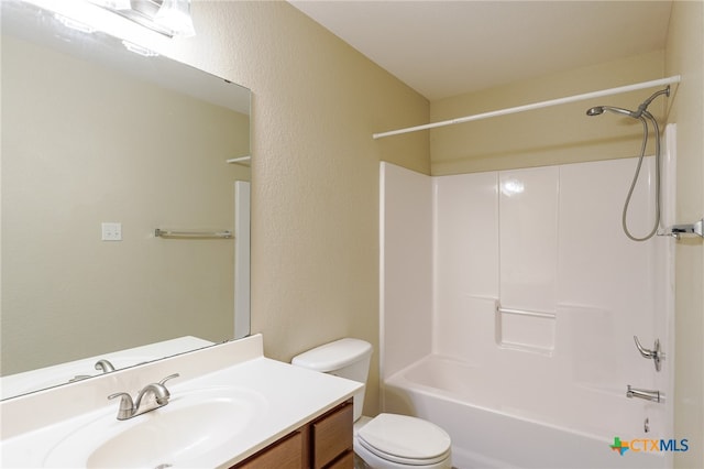 full bathroom with bathtub / shower combination, vanity, and toilet