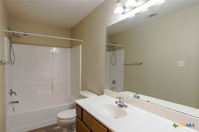 full bathroom featuring wood-type flooring, vanity, toilet, and shower / tub combination