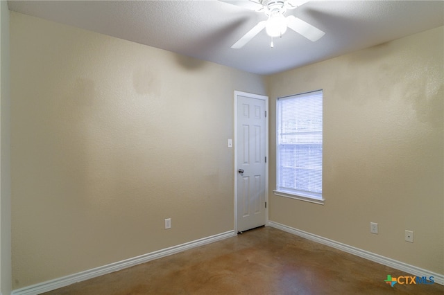 empty room featuring ceiling fan