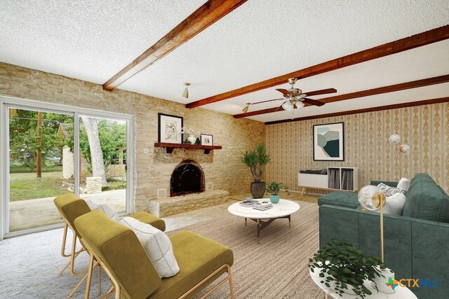 carpeted living room with a stone fireplace, beamed ceiling, a textured ceiling, and ceiling fan