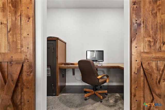 office area with concrete flooring