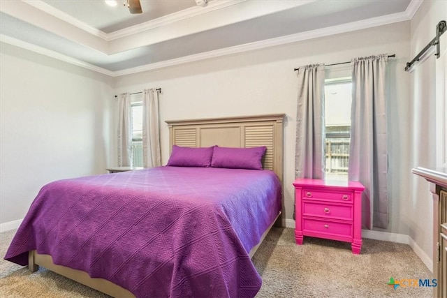 7516 Hardin Dr, Temple, TX 76502 - bedroom with carpet, crown molding, baseboards, a raised ceiling, and a ceiling fan