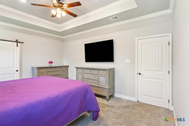 7516 Hardin Dr, Temple, TX 76502 - carpeted bedroom featuring a tray ceiling, crown molding, a barn door, a ceiling fan, and baseboards