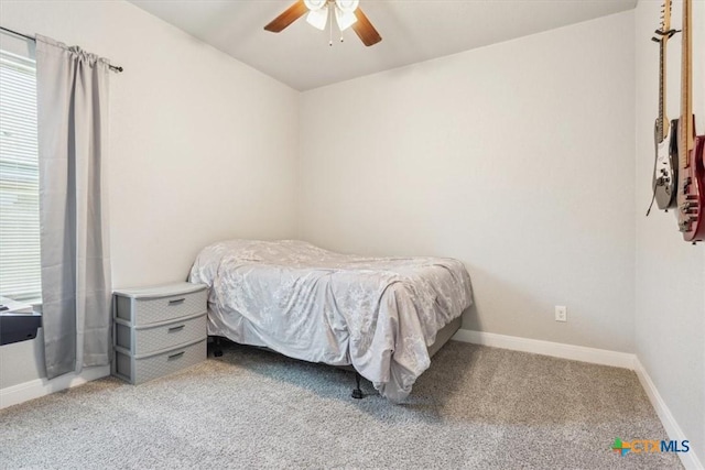 7516 Hardin Dr, Temple, TX 76502 - carpeted bedroom featuring baseboards and a ceiling fan