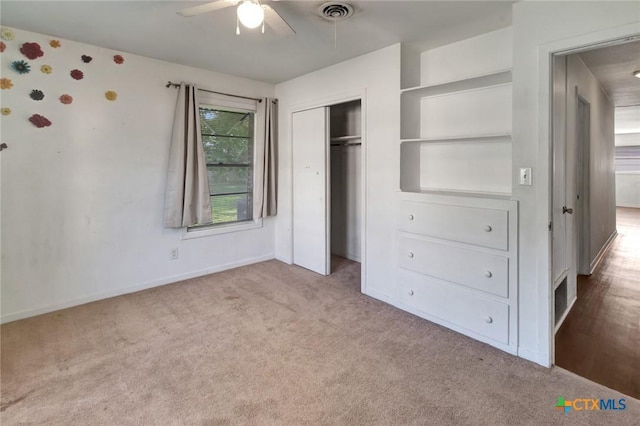 2307 E Airline Rd, Victoria, TX 77901 - unfurnished bedroom featuring carpet, a closet, and ceiling fan