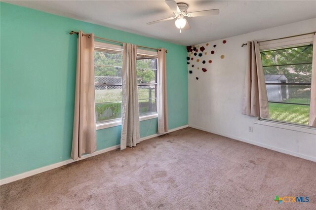 2307 E Airline Rd, Victoria, TX 77901 - unfurnished room with carpet floors and a ceiling fan