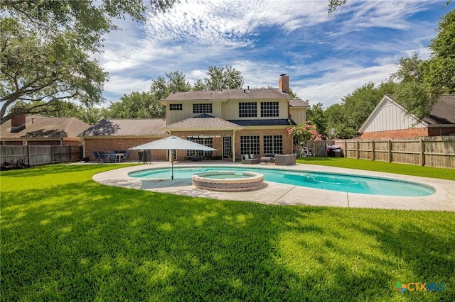 504 Masters Dr, Victoria, TX 77904 - view of pool featuring a fenced backyard, an in-ground hot tub, and a patio area