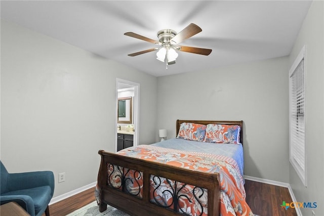 504 Masters Dr, Victoria, TX 77904 - bedroom with wood finished floors, ensuite bathroom, and ceiling fan
