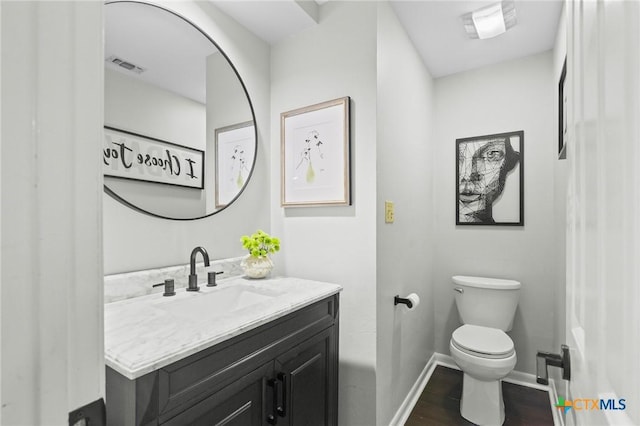 504 Masters Dr, Victoria, TX 77904 - bathroom featuring vanity and wood finished floors