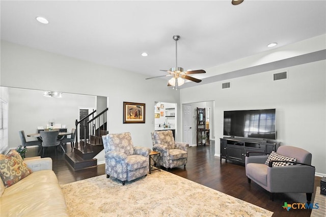 504 Masters Dr, Victoria, TX 77904 - living room with wood finished floors, recessed lighting, ceiling fan, and stairway